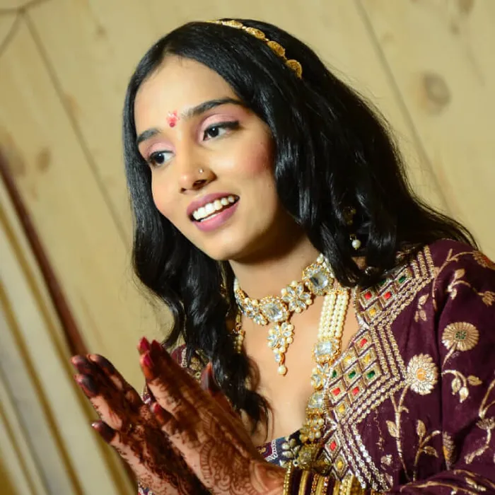 Mehendi function bridal makeup in maroon outfit, Megha Makeover & Beauty Salon